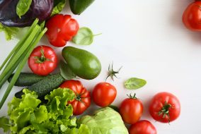 set of fresh vegetables, farm food on light surface